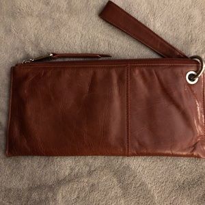 Hobo wristlet purse in like new excellent condition in brownish wine color
